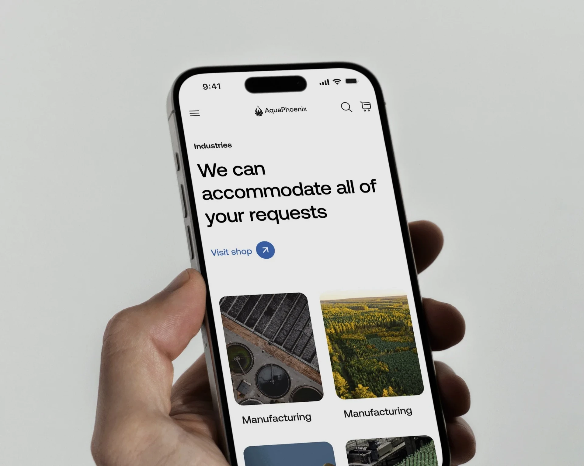 Mobile Industries page design shown on a phone in hand
